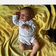 Ila joined the competition — help win amazing prizes! baby, sleeping, infant, blanket, yellow, white_clothing, peaceful, newborn, soft_texture, lying_down, cute, child, indoors, resting, skin, face, hand, foot, portrait, cozy