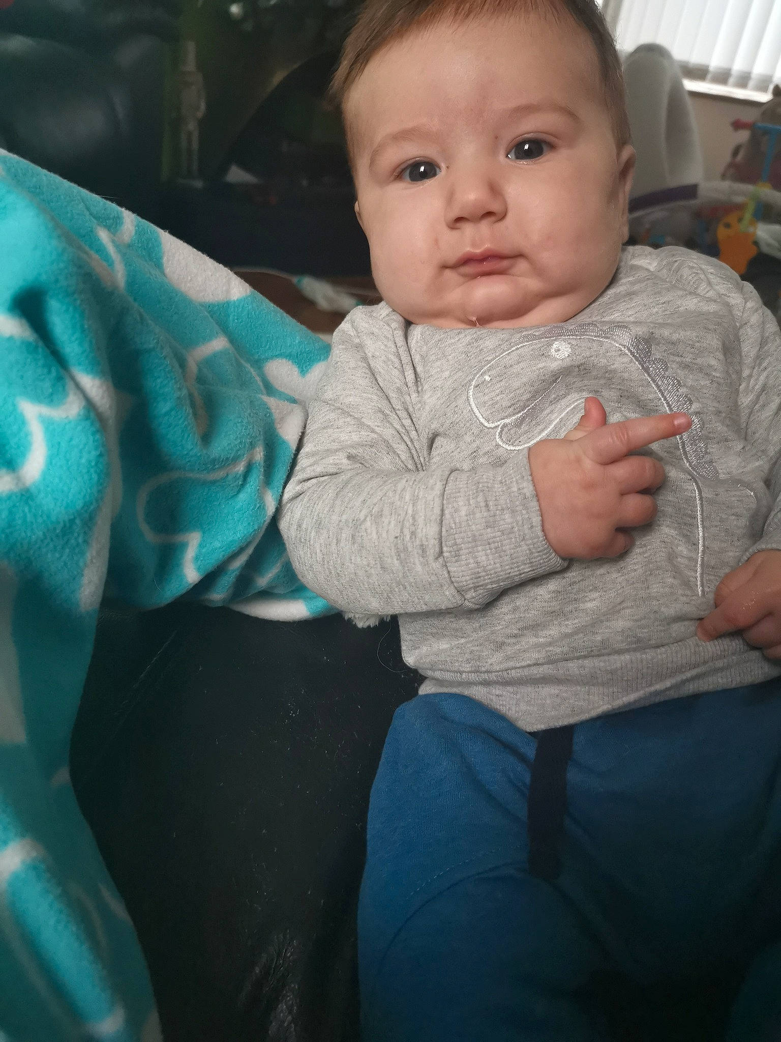 Riley is registered to the contest to win money with this photo: baby, cheek, child, cool, eye, face, head, lip, nose, people, person, sitting, skin, smile, toddler