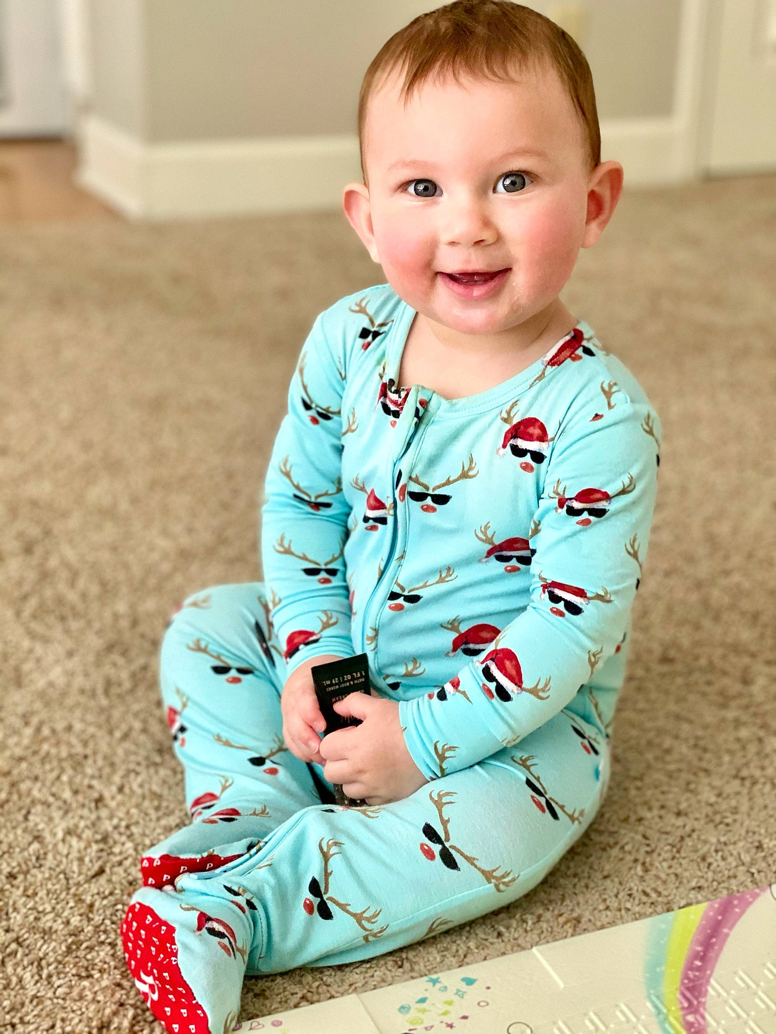 Bria joined the competition — help win amazing prizes! baby, baby_toddler_clothing, cheek, child, ear, eye, face, facial_expression, head, human, human_body, iris, joy, mammal, mouth, nose, person, play, sitting, skin