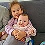 baby, child, clothing, comfort, couch, cuddling, cute, face, family, happy, home, hug, indoor, love, person, playful, sitting, smile, toddler, toy