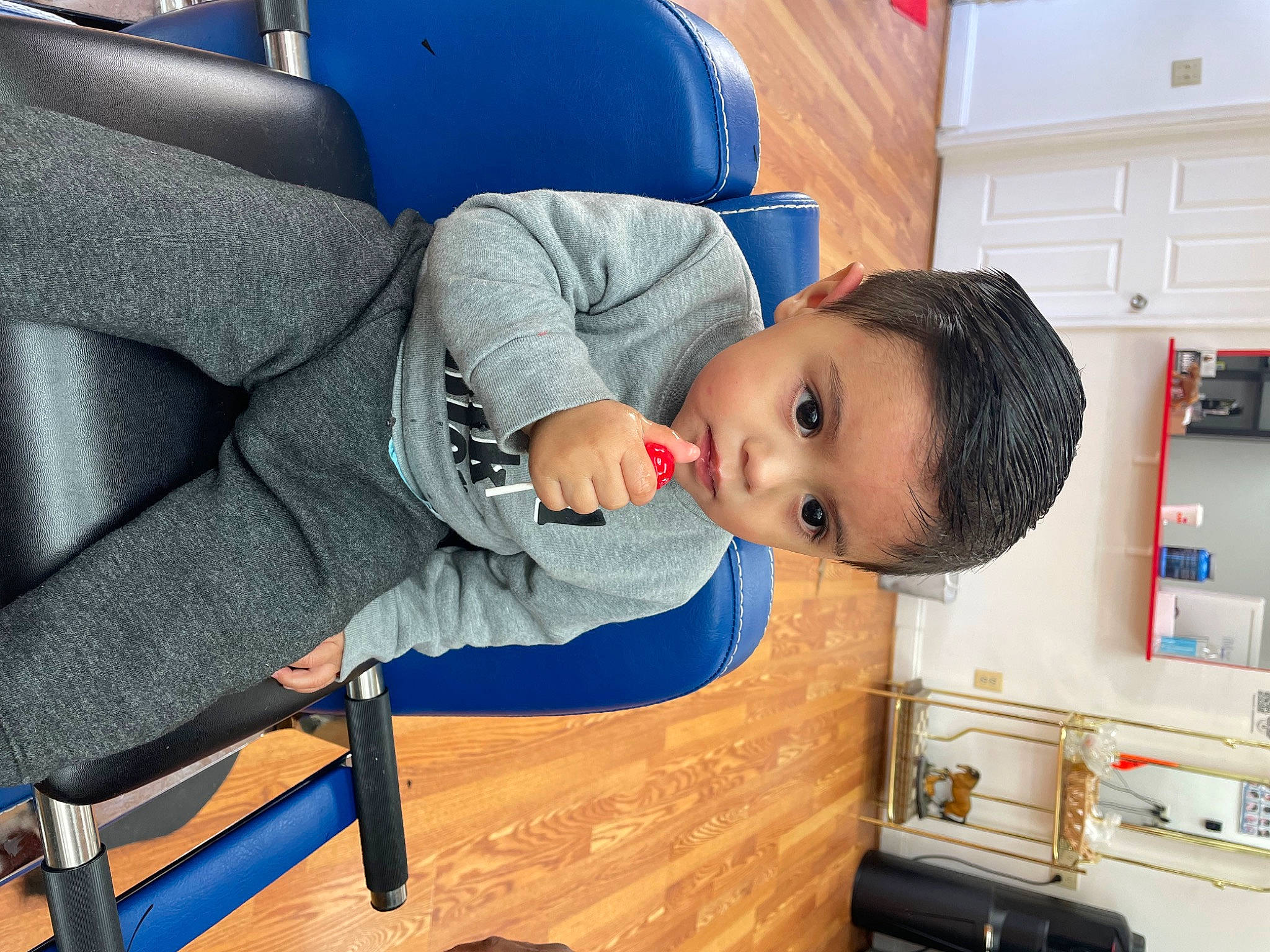 Bryan joined the competition — help win amazing prizes! baby, baby_products, cabinetry, car_seat, child, comfort, drawer, flooring, fun, hardwood, home_appliance, kitchen_appliance, leg, mammal, person, room, shelf, sitting, suit, toddler