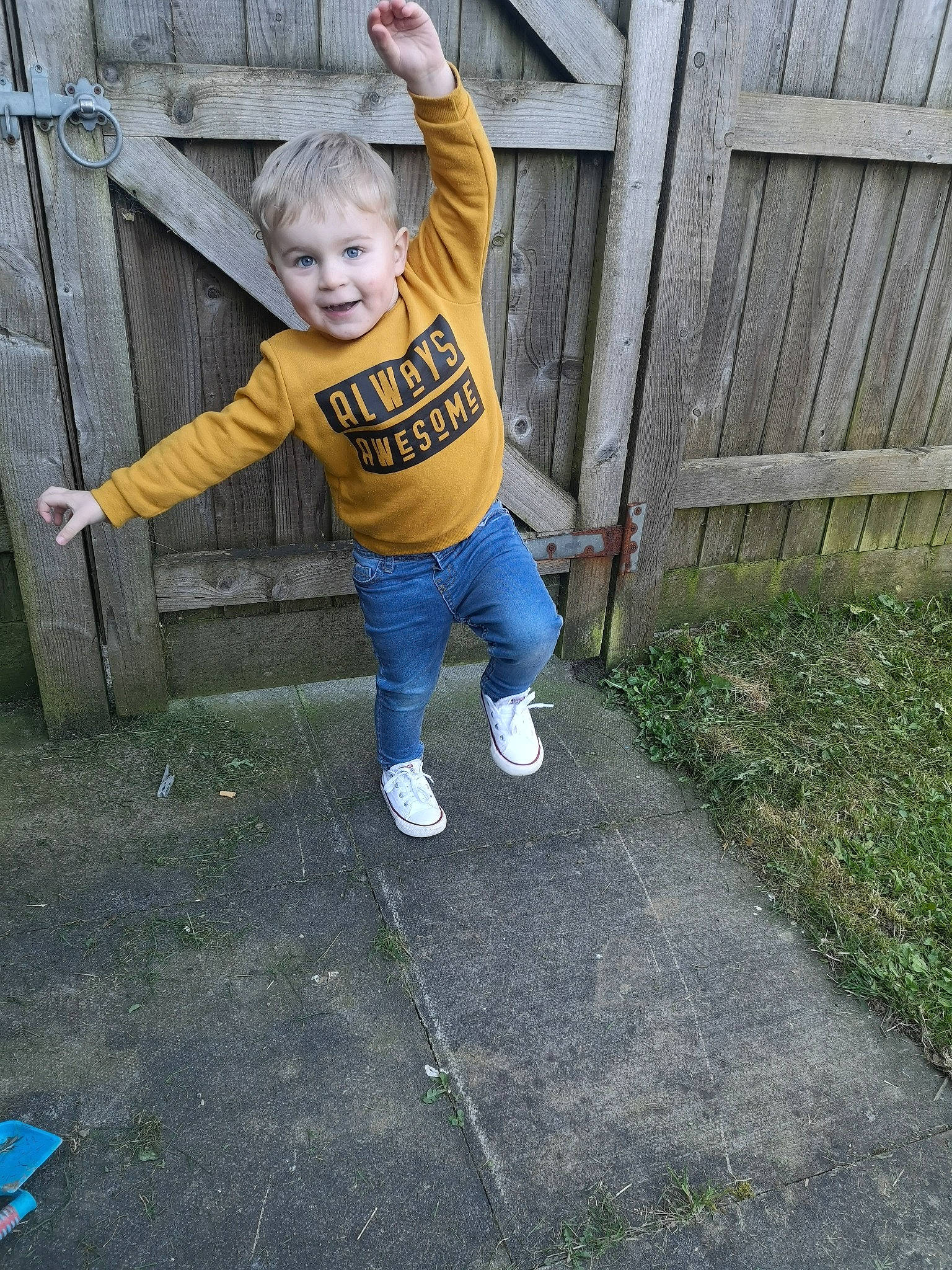 Rogan joined the competition — help win amazing prizes! backyard, child, fun, jacket, jeans, jumping, outerwear, person, play, smile, t_shirt, toddler, vacation, yard