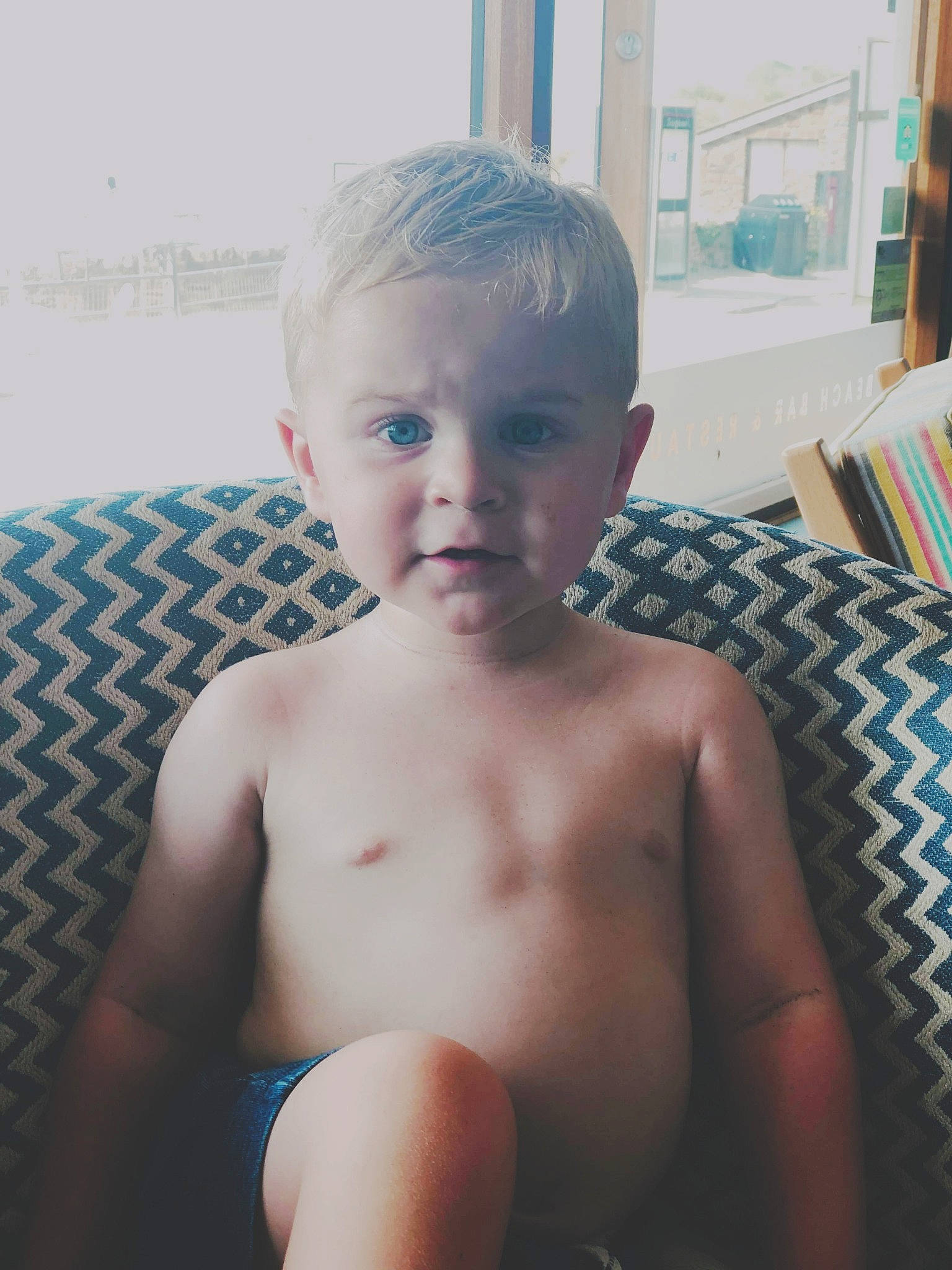 Rogan is registered to the contest to win money with this photo: arm, barechested, blond, cheek, chest, child, cool, eye, face, forehead, hair, head, joint, lip, muscle, nose, person, shoulder, skin, toddler