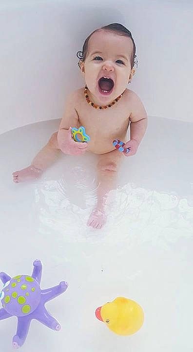 Scarlett is registered to the contest to win money with this photo: anger, bathing, child, finger, hand, infant, pink, play, toddler, toy