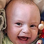 Roman joined the competition — help win amazing prizes! baby, smiling, face, child, toy, blanket, clothing, happy, infant, cute, portrait, closeup, skin, head, expression, toddler, indoors, human, play, comfort