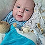 Roman joined the competition — help win amazing prizes! baby, infant, smiling, blue_eyes, blanket, soft_toy, pacifier, close_up, face, child, cute, cozy, wrapped, fabric, comfort, expression, indoor, person, newborn, happy