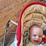 Roman joined the competition — help win amazing prizes! baby, infant, smiling, toy, infant_carrier, blanket, wooden_floor, happy, child, person, indoors, clothing, head, face, seated, cute, playful, toddler, carpet, fabric