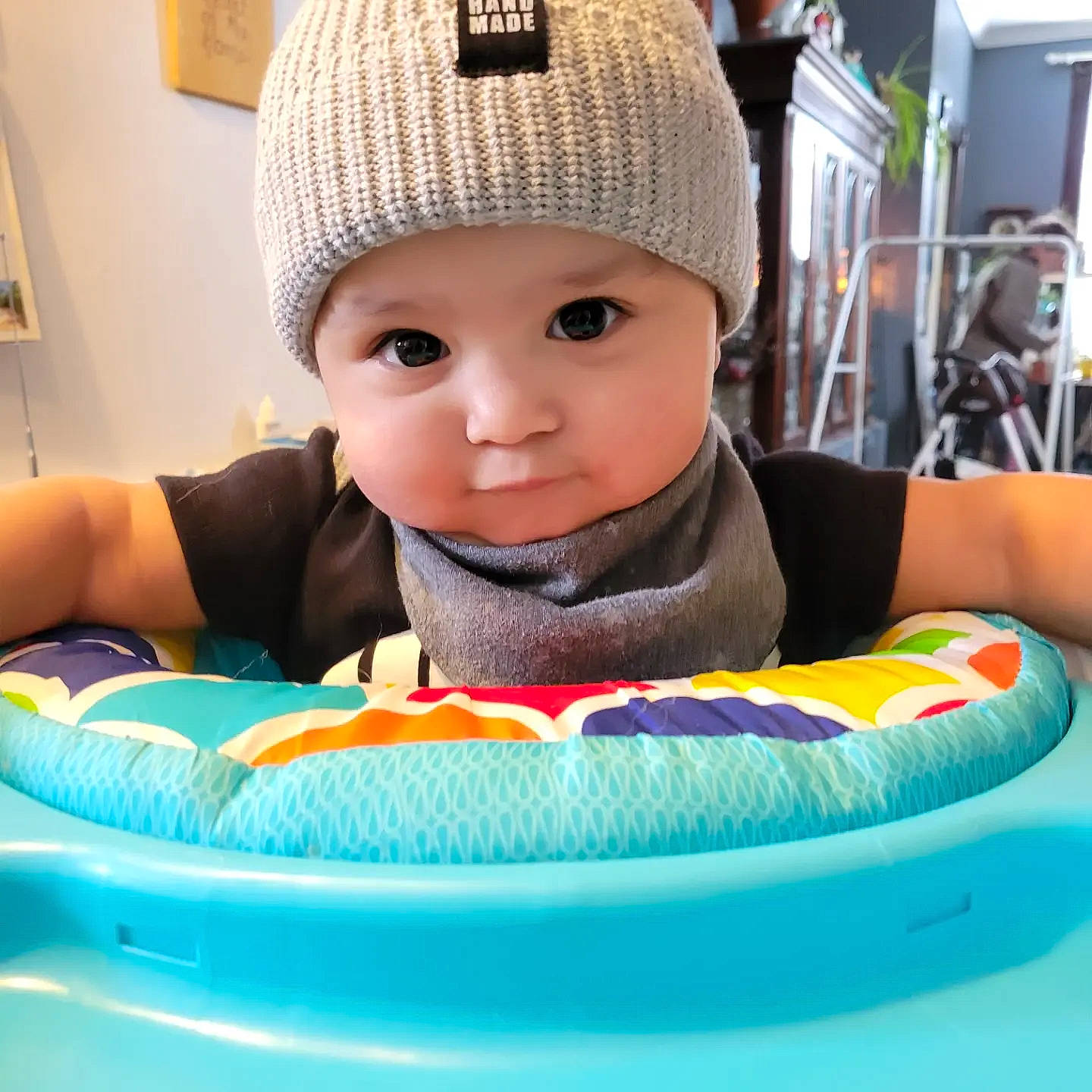Keegan is registered to the contest to win money with this photo: baby, baby_playing_with_toys, baby_products, baby_sleeping, baby_toddler_clothing, beanie, beauty, cap, child, comfort, electric_blue, fashion_accessory, fun, headwear, knit_cap, leisure, pattern, person, product, recreation