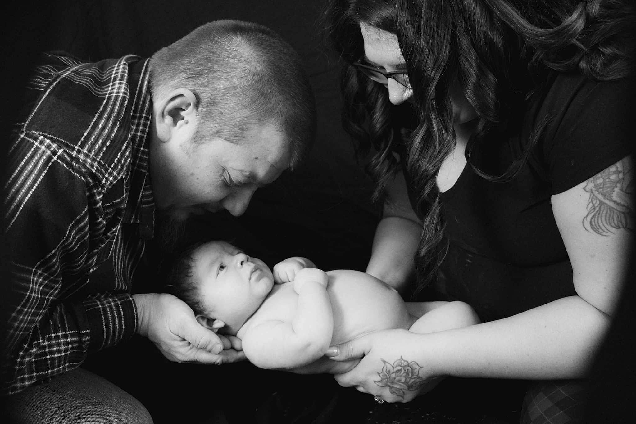 Brian is registered to the contest to win money with this photo: arm, baby, black, black_and_white, child, comfort, elbow, flash_photography, fun, gesture, hair, hand, happy, human, interaction, monochrome, monochrome_photography, mouth, person, style