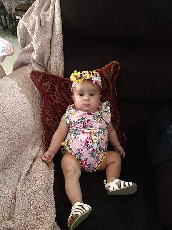 Genniah joined the competition — help win amazing prizes! baby, baby_products, baby_toddler_clothing, child, comfort, couch, fashion_accessory, happy, human_leg, linens, magenta, pattern, person, pink, purple, sitting, sleeve, sock, textile, thigh