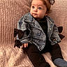 baby, black_outfit, blanket, blue_eyes, bow, child, chubby_cheeks, cozy, cute, denim_jacket, fashion, gaze, hair_bows, indoor, infant, knitted_blanket, portrait, sitting, socks, soft_texture