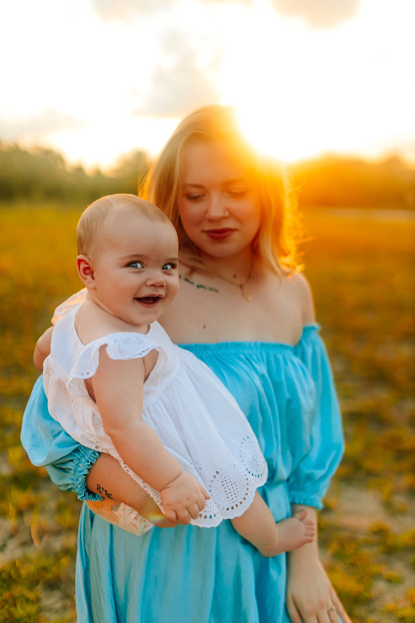 Malia joined the competition — help win amazing prizes! baby, beauty, face, flash_photography, fun, gesture, grass, grassland, happy, meadow, people, people_in_nature, person, plant, skin, sky, smile, standing, summer, sunlight