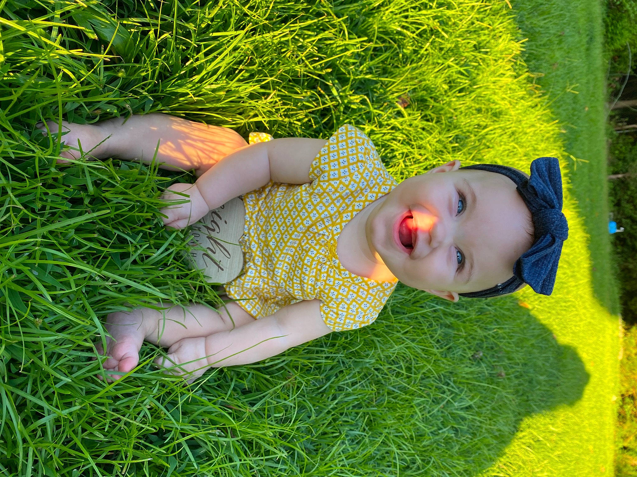 Malia joined the competition — help win amazing prizes! baby, baby_toddler_clothing, botany, child, fun, garden, grass, grassland, green, groundcover, happy, headwear, joy, lawn, leisure, meadow, pattern, people_in_nature, person, plant