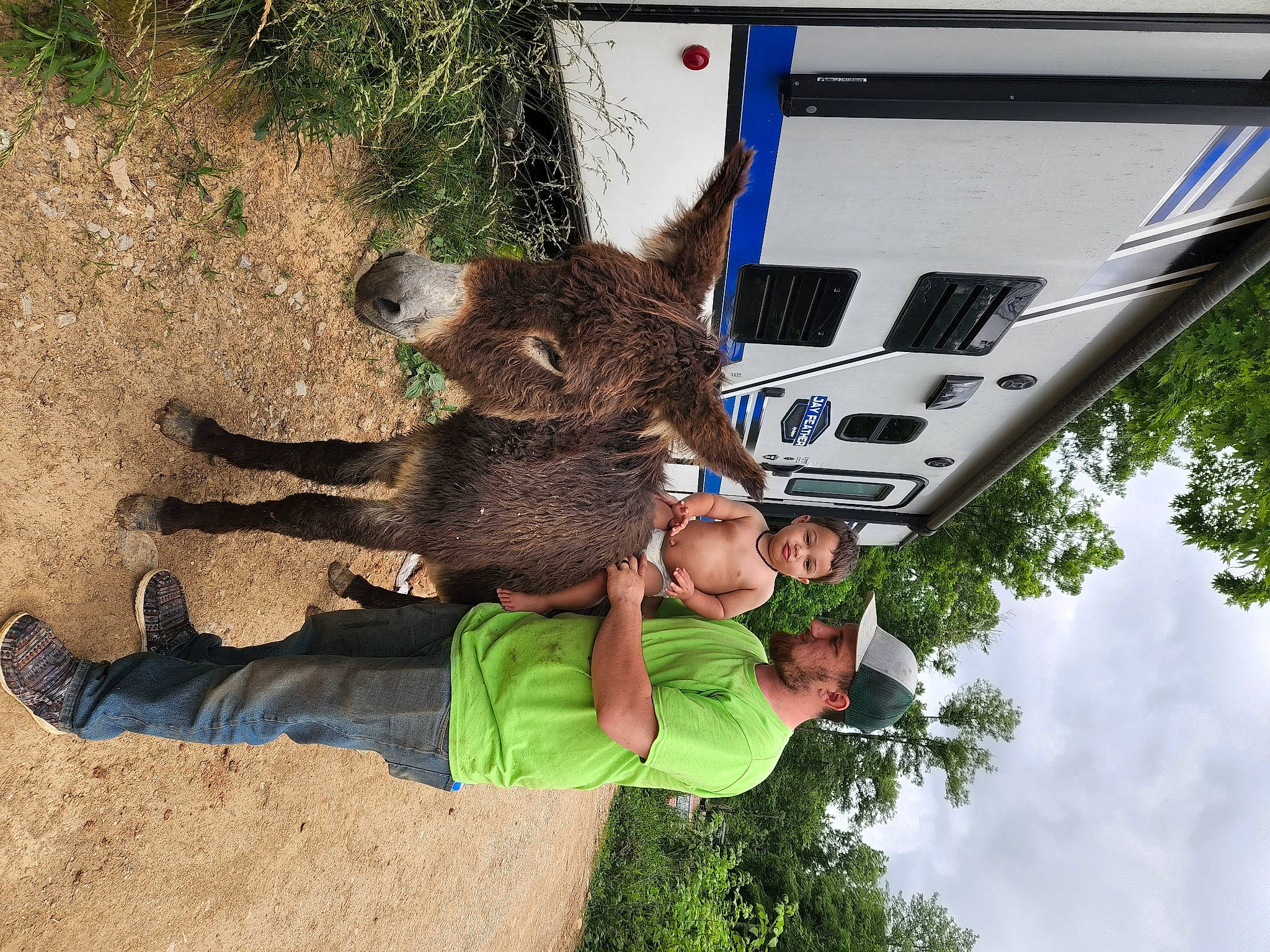Braxton joined the competition — help win amazing prizes! automotive_exterior, cloud, family_car, fun, grass, headwear, leisure, person, plant, recreation, sky, soil, toddler, tree