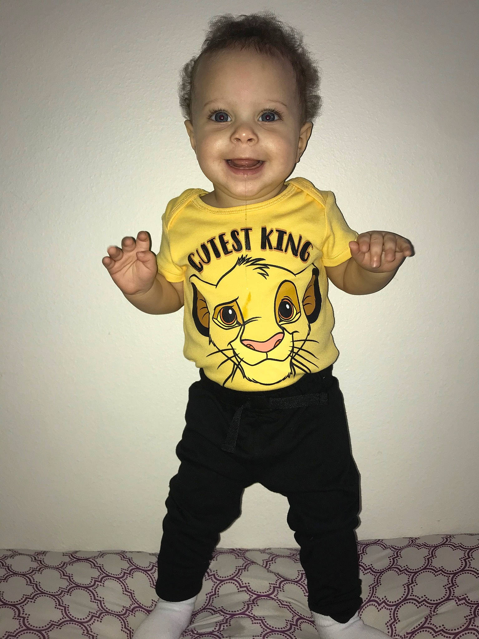 Kallel is registered to the contest to win money with this photo: baby, baby_toddler_clothing, child, cool, happy, joy, muscle, person, sleeve, smile, standing, t_shirt, toddler, top, yellow