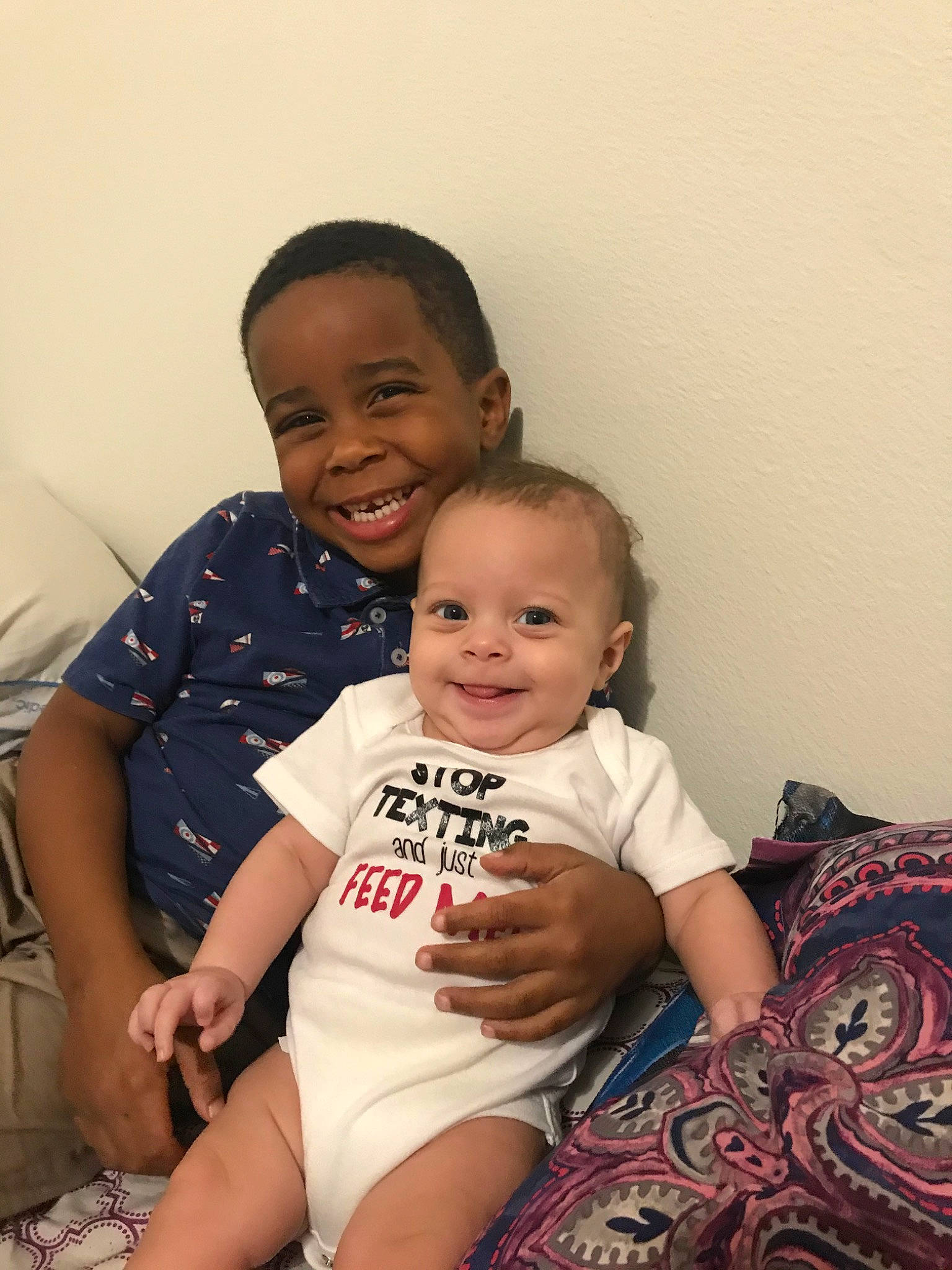 Kadyn is registered to the contest to win money with this photo: baby, cheek, child, daughter, face, family, happy, head, joy, leg, mother, people, person, sibling, sitting, skin, smile, t_shirt, toddler