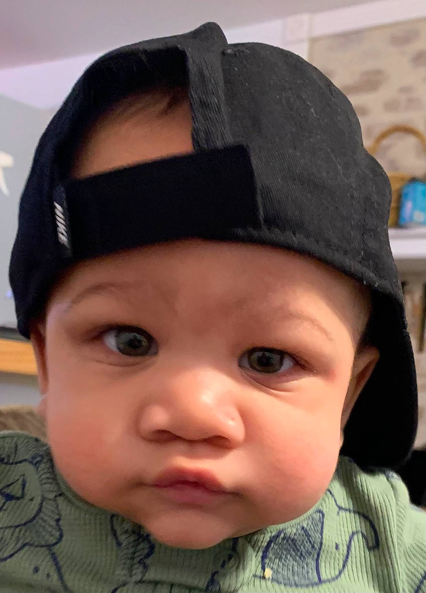 Kastyn is registered to the contest to win money with this photo: baby, cap, cheek, child, chin, clothing, eye, eyebrow, eyelash, fashion_accessory, forehead, hat, headgear, headwear, knit_cap, lip, nose, outerwear, person, skin
