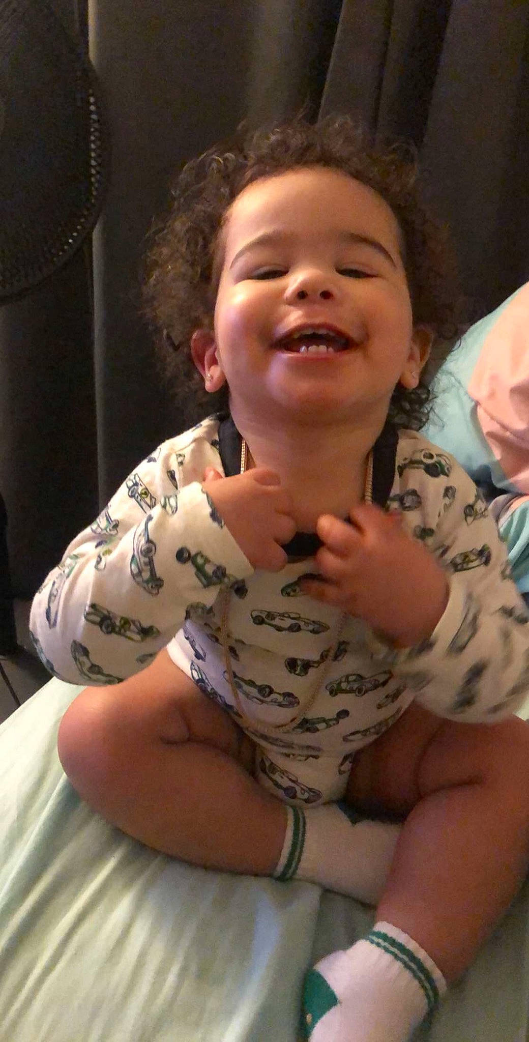 Naive is registered to the contest to win money with this photo: arm, baby, cheek, child, face, facial_expression, head, nose, person, skin, smile, toddler