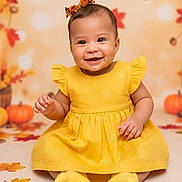Elaia joined the competition — help win amazing prizes! autumn, baby, child, colorful, cute, decor, fall_leaves, festive, happy, headband, indoor, infant, person, portrait, pumpkins, seasonal, sitting, smiling, studio_photo, yellow_dress