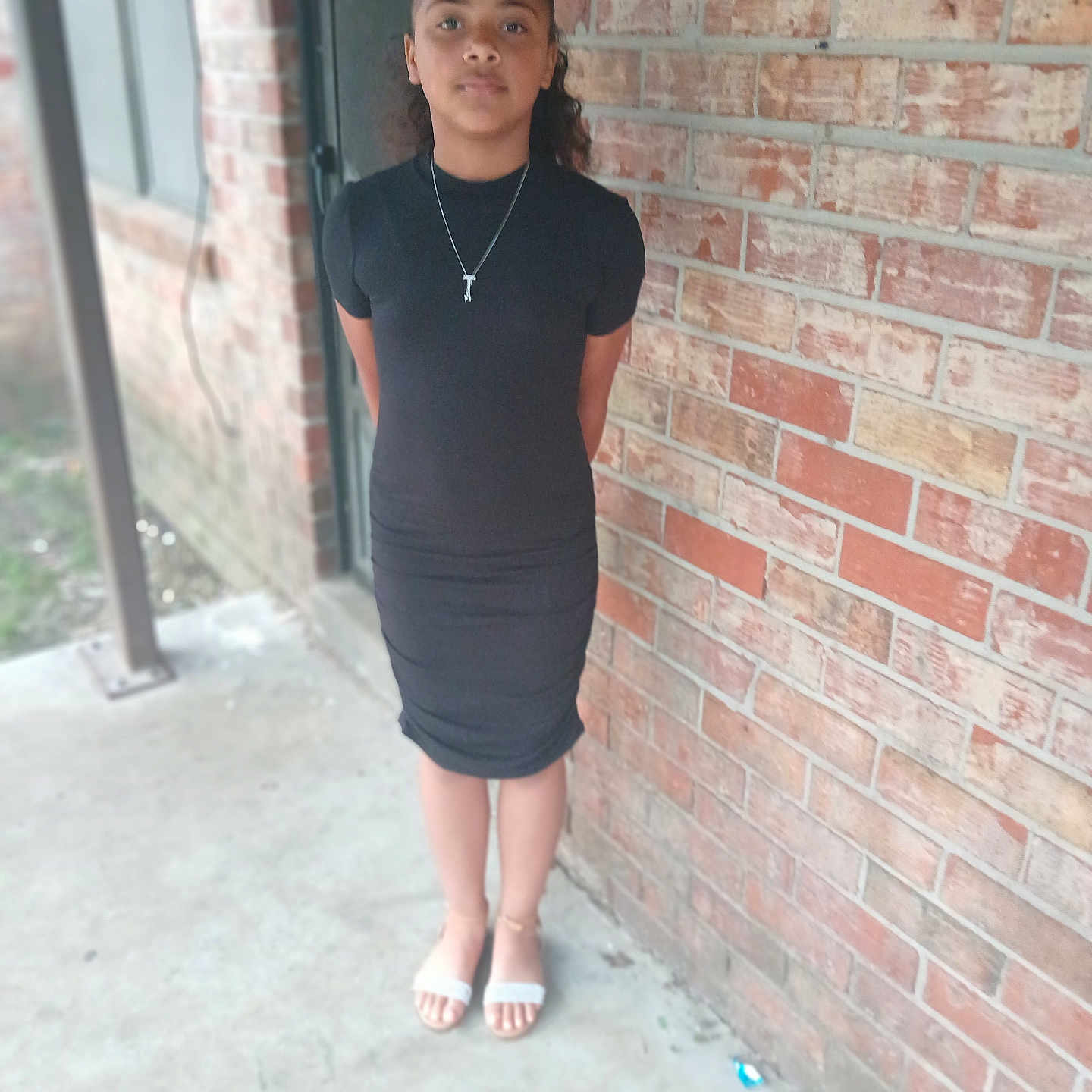 Tavaeh is registered to the contest to win money with this photo: accessories, adult, blouse, brick, clothing, dress, face, female, footwear, head, jewelry, necklace, person, photography, portrait, sandal, skirt, sleeve, standing, woman