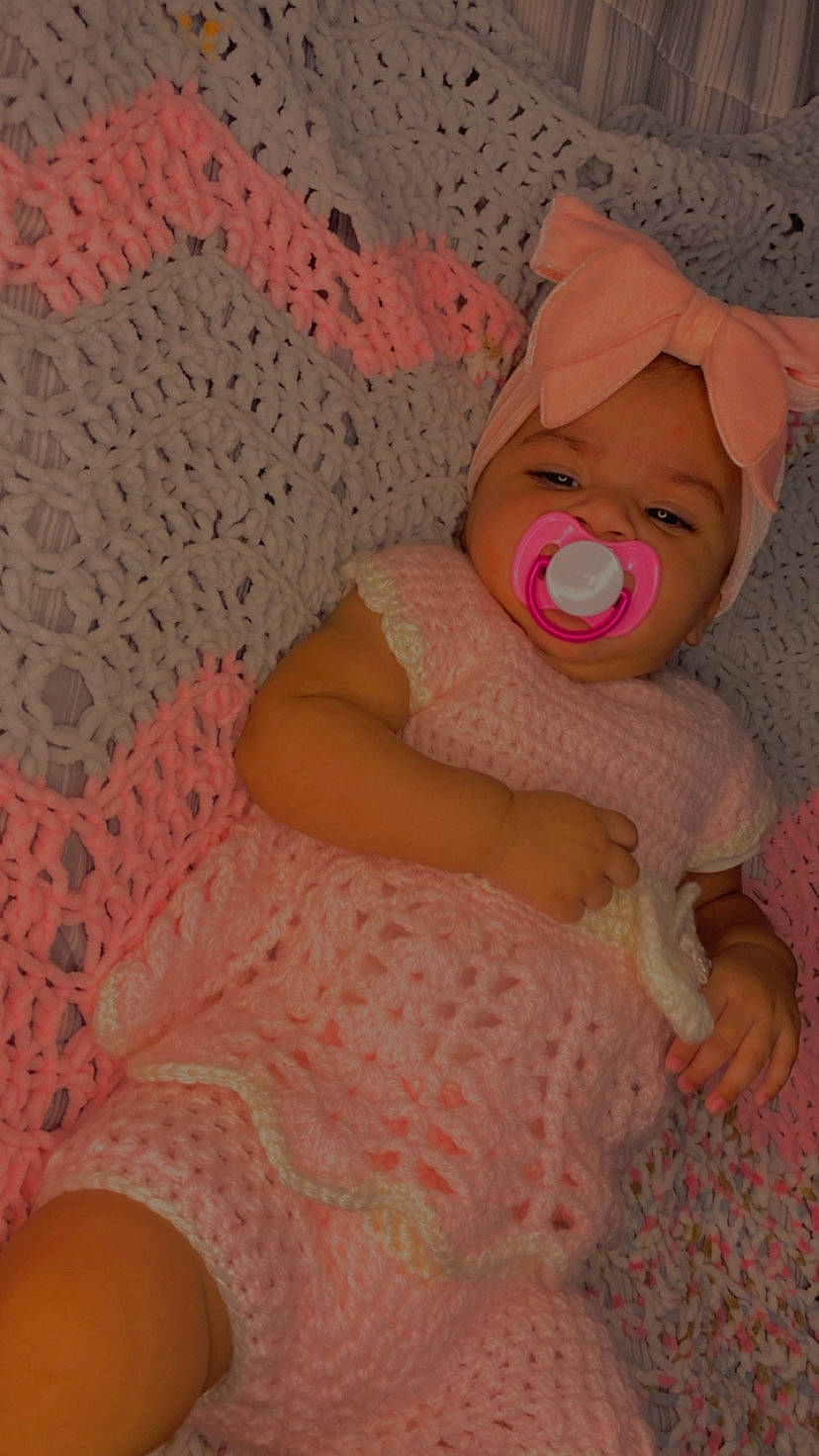 Jeilianis joined the competition — help win amazing prizes! baby, baby_sleeping, baby_toddler_clothing, cheek, comfort, fawn, flesh, human_leg, linens, magenta, pattern, peach, person, pink, room, sitting, textile, thigh, thumb, toddler