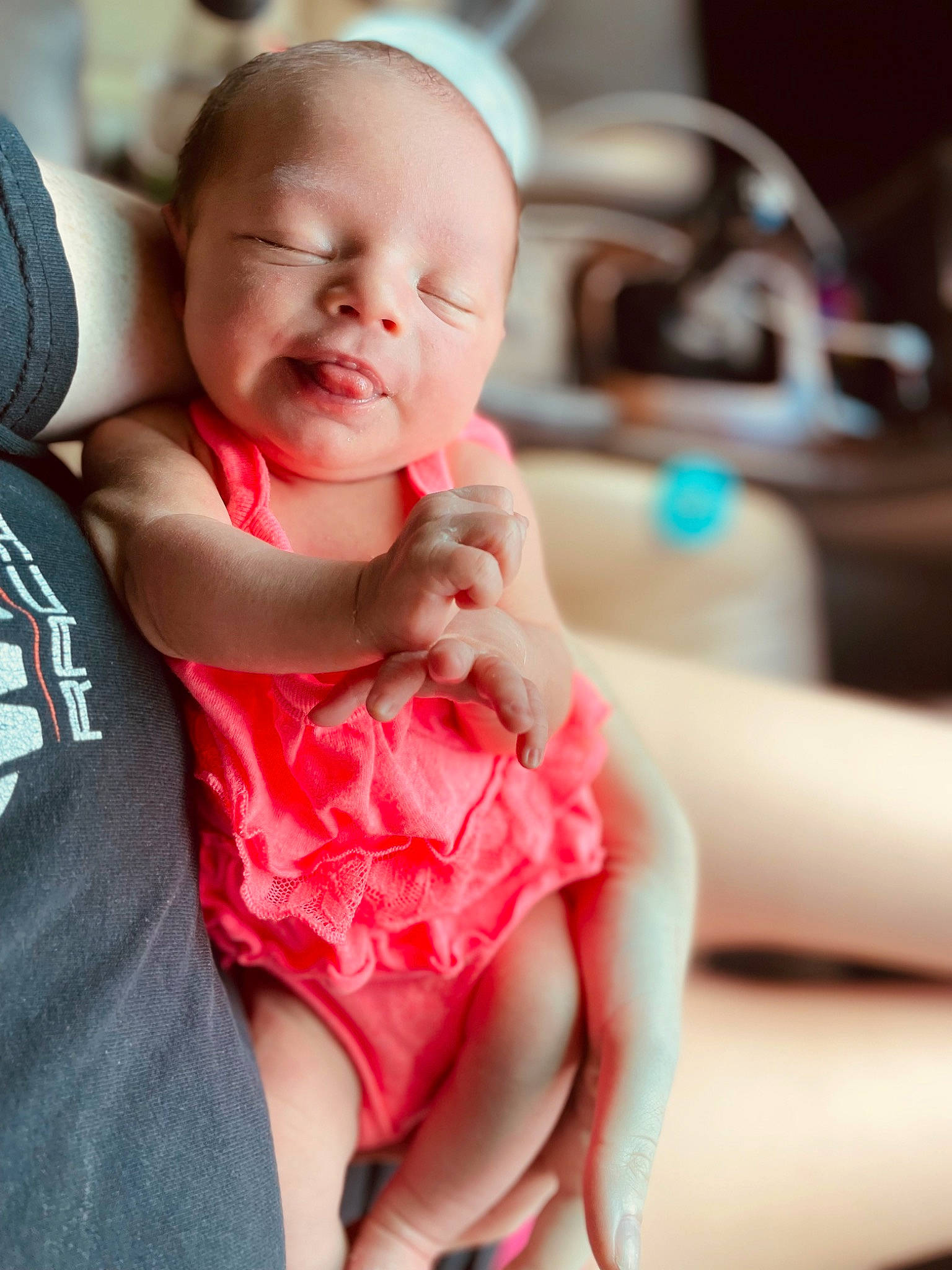 Hensley is registered to the contest to win money with this photo: baby, baby_toddler_clothing, child, comfort, dress, eye, face, finger, gesture, hairstyle, happy, lip, mouth, person, skin, sleeve, smile, t_shirt, thigh, thumb