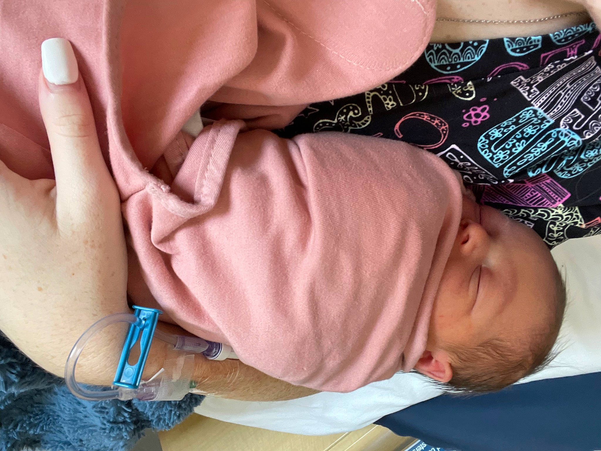 Hensley is registered to the contest to win money with this photo: arm, baby_toddler_clothing, cheek, eyelash, finger, gesture, hand, joint, lip, mouth, muscle, nail, neck, nose, organ, person, pink, product, skin, sleeve