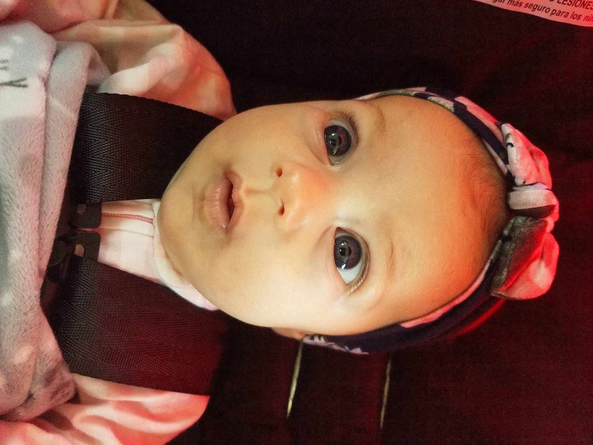 Mallory is registered to the contest to win money with this photo: baby, cheek, chin, ear, eye, eyebrow, eyelash, facial_expression, flash_photography, hairstyle, hat, headgear, iris, lip, mouth, neck, nose, person, skin, smile