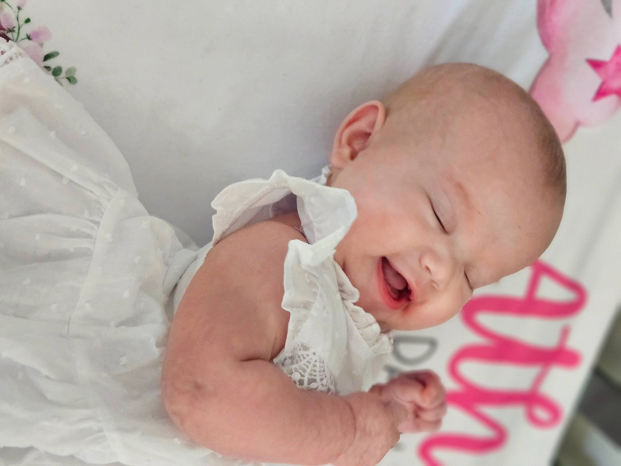 Athena joined the competition — help win amazing prizes! arm, baby, baby_products, baby_sleeping, baby_toddler_clothing, cheek, comfort, dress, ear, eye, happy, headgear, iris, lip, nose, person, pink, skin, sleeve, smile