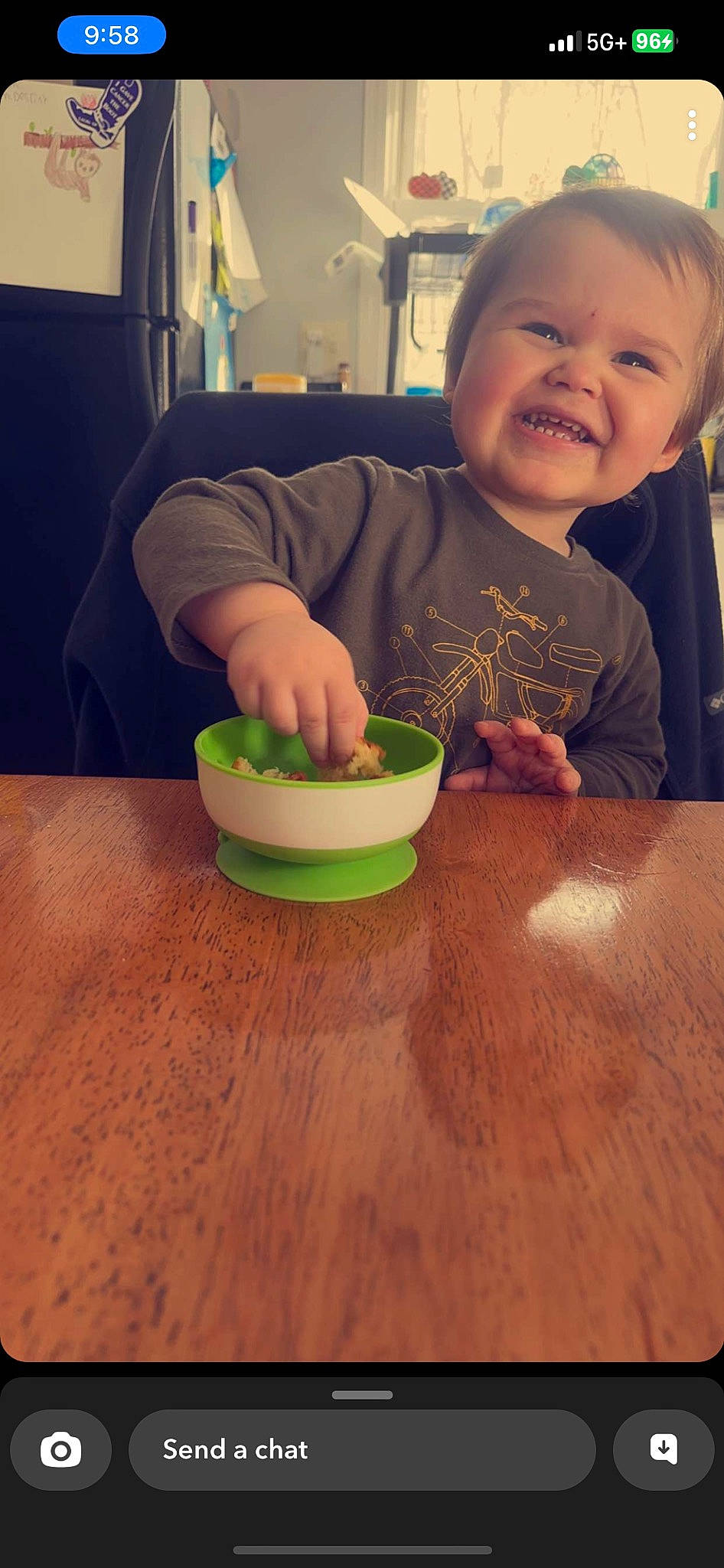 Kayden is registered to the contest to win money with this photo: baby_grabbing_for_something, baby_toddler_clothing, child, cooking, cuisine, dish, drink, flooring, food, fun, happy, hardwood, ingredient, joy, person, smile, spoon, table, tableware, toddler