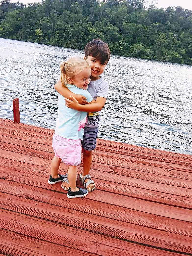Adaline is registered to the contest to win money with this photo: boardwalk, child, dock, fun, happy, joy, lake, leisure, nonbuilding_structure, person, photograph, photography, pier, play, recreation, summer, toddler, vacation, water, wood