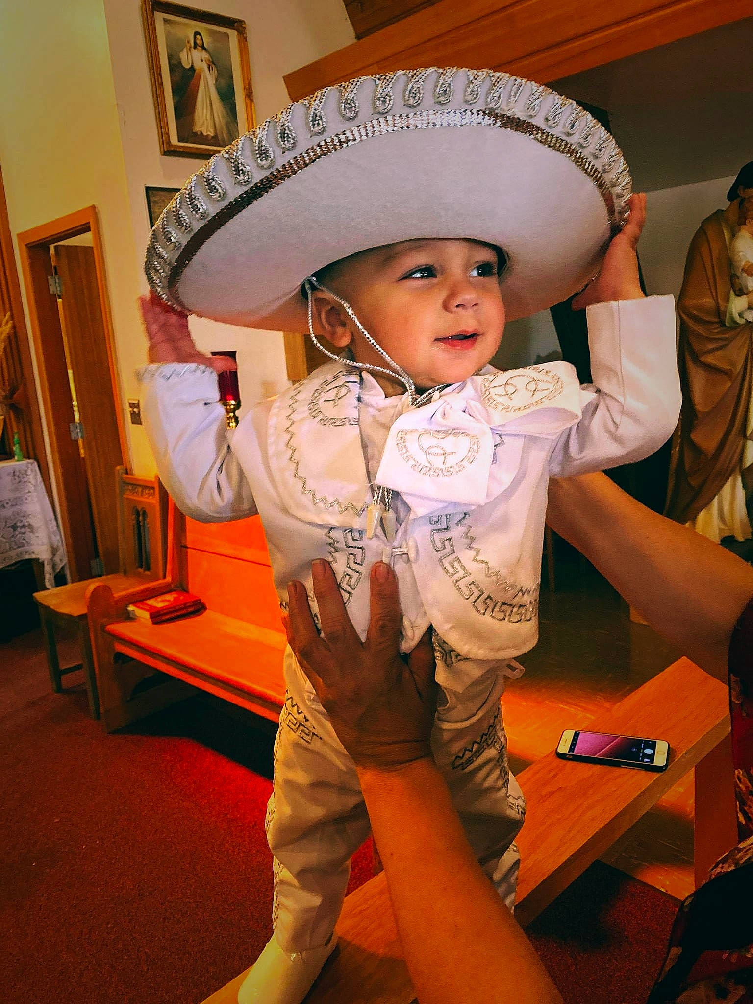 Liam joined the competition — help win amazing prizes! baby, cap, cool, costume, costume_hat, cowboy_hat, facial_expression, fashion_accessory, floor, flooring, fun, happy, hat, headwear, party_supply, person, personal_protective_equipment, picture_frame, sombrero, sun_hat