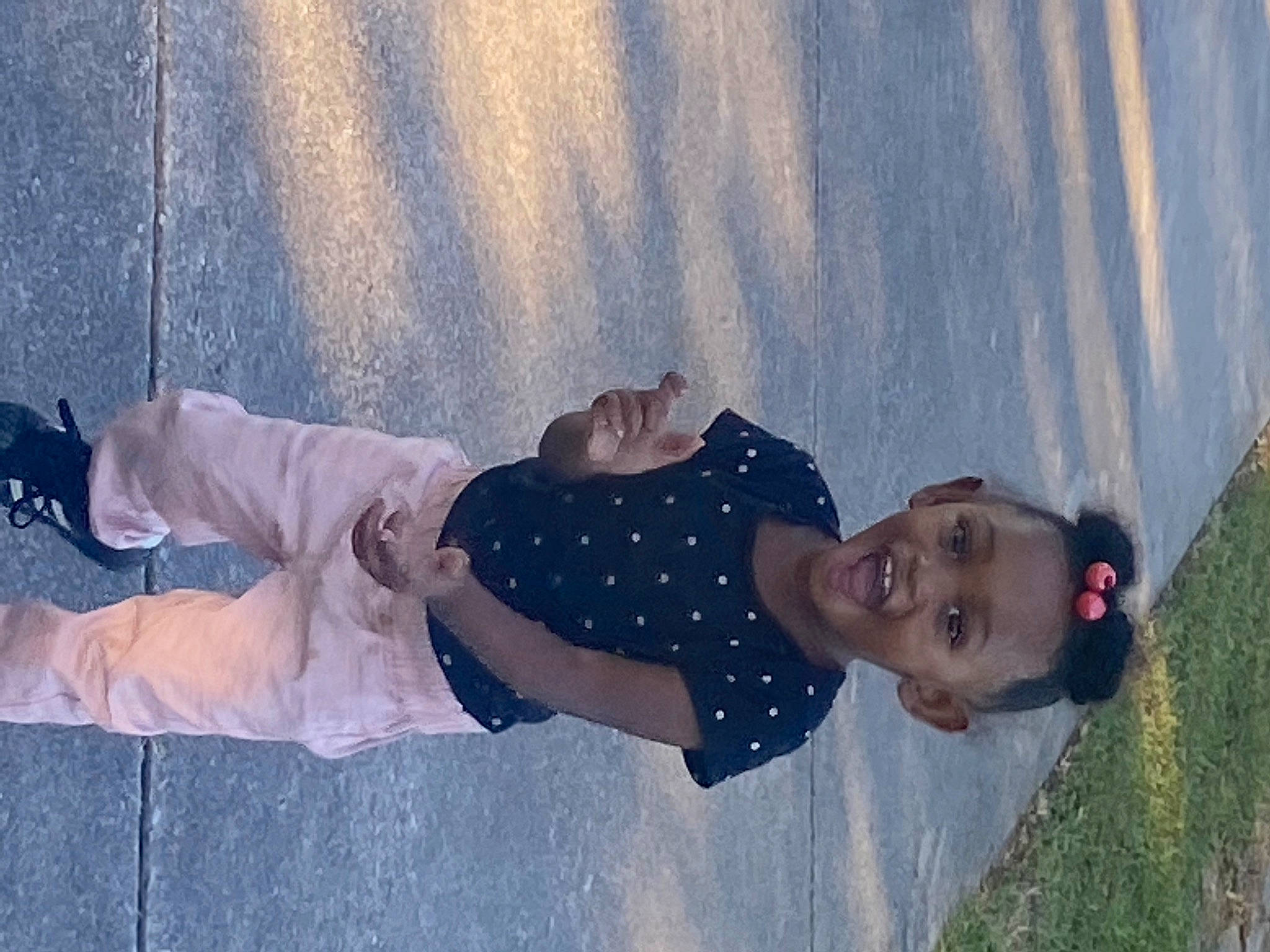 Amira joined the competition — help win amazing prizes! child, cool, eyewear, fun, grass, happy, human_leg, knee, leisure, pattern, people_in_nature, person, plant, recreation, shadow, smile, sunglasses, toddler, tree