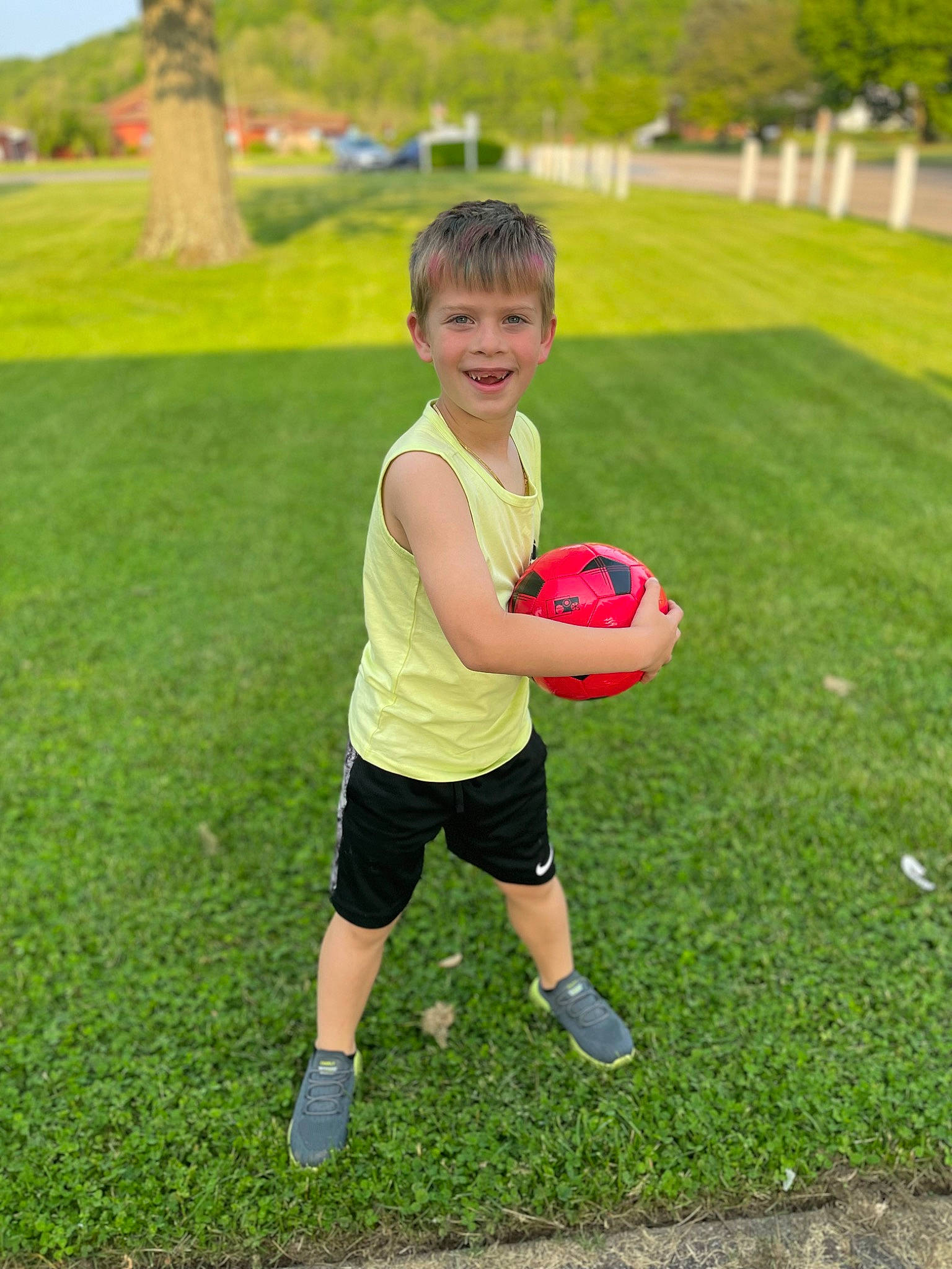Claytyn is registered to the contest to win money with this photo: ball, ball_game, football, grass, happy, joy, leisure, people_in_nature, person, plant, player, playing_sports, recreation, shoe, shorts, smile, sneakers, soccer_ball, sports, sports_equipment