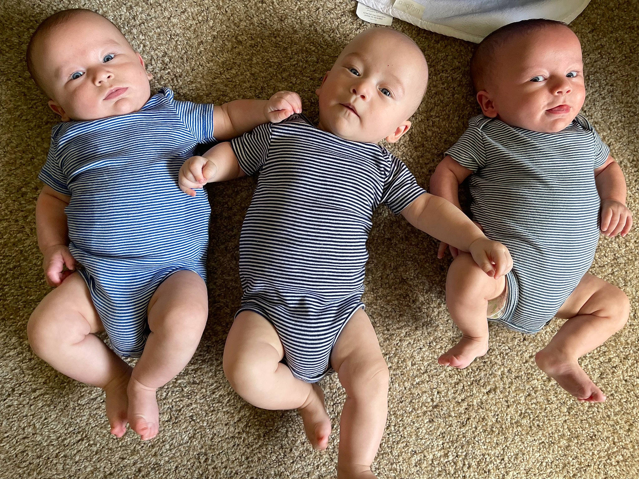 Colt Cash Blake joined the competition — help win amazing prizes! baby, baby_toddler_clothing, comfort, eye, face, facial_expression, finger, hand, happy, head, human_body, interaction, iris, leg, person, photograph, skin, sleeve, standing, toddler