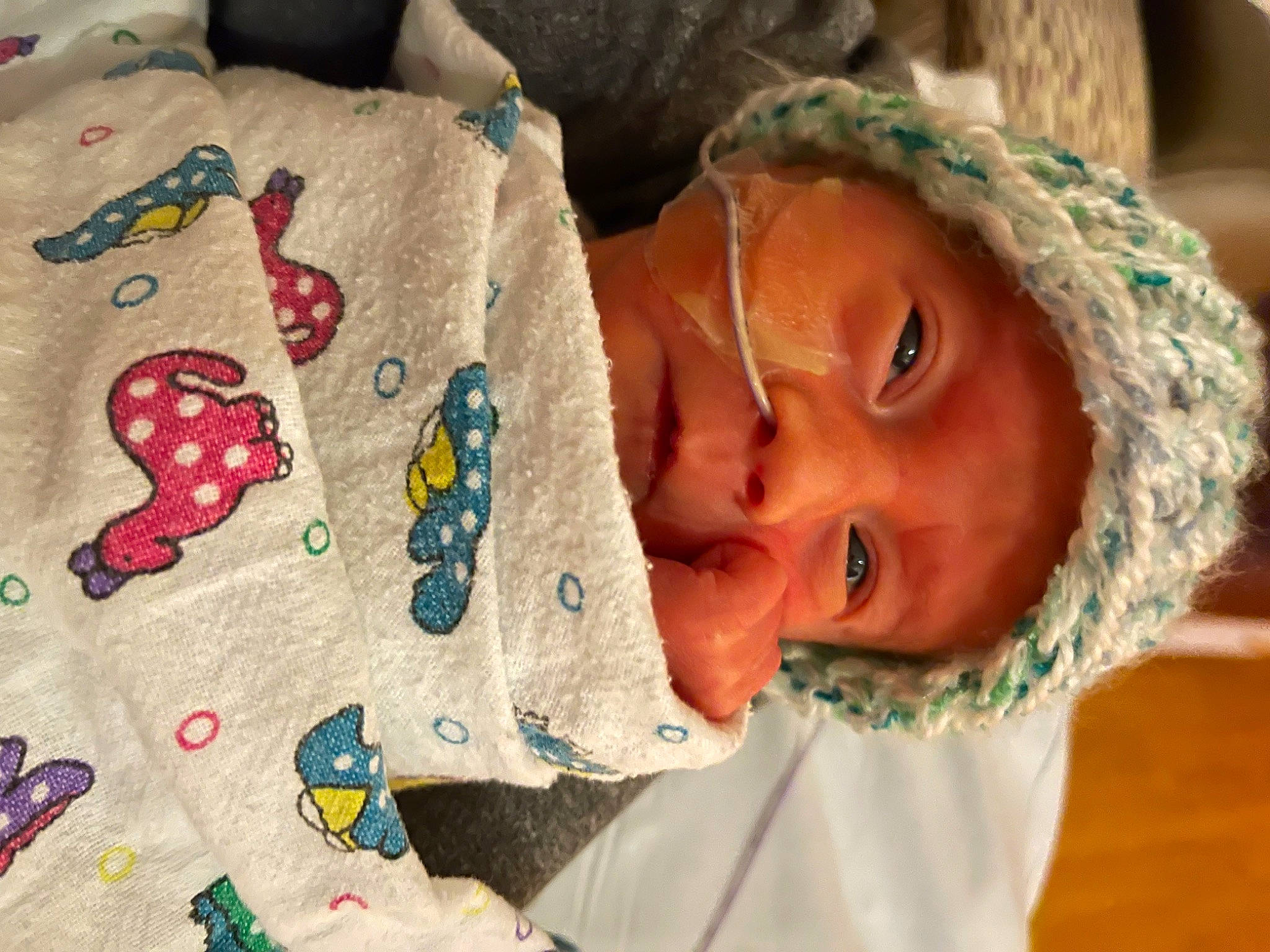 Colt Cash Blake is registered to the contest to win money with this photo: adaptation, baby, baby_toddler_clothing, cheek, child, chin, comfort, eye, facial_expression, happy, head, headwear, human_body, mouth, nose, organ, person, product, skin, sleeve