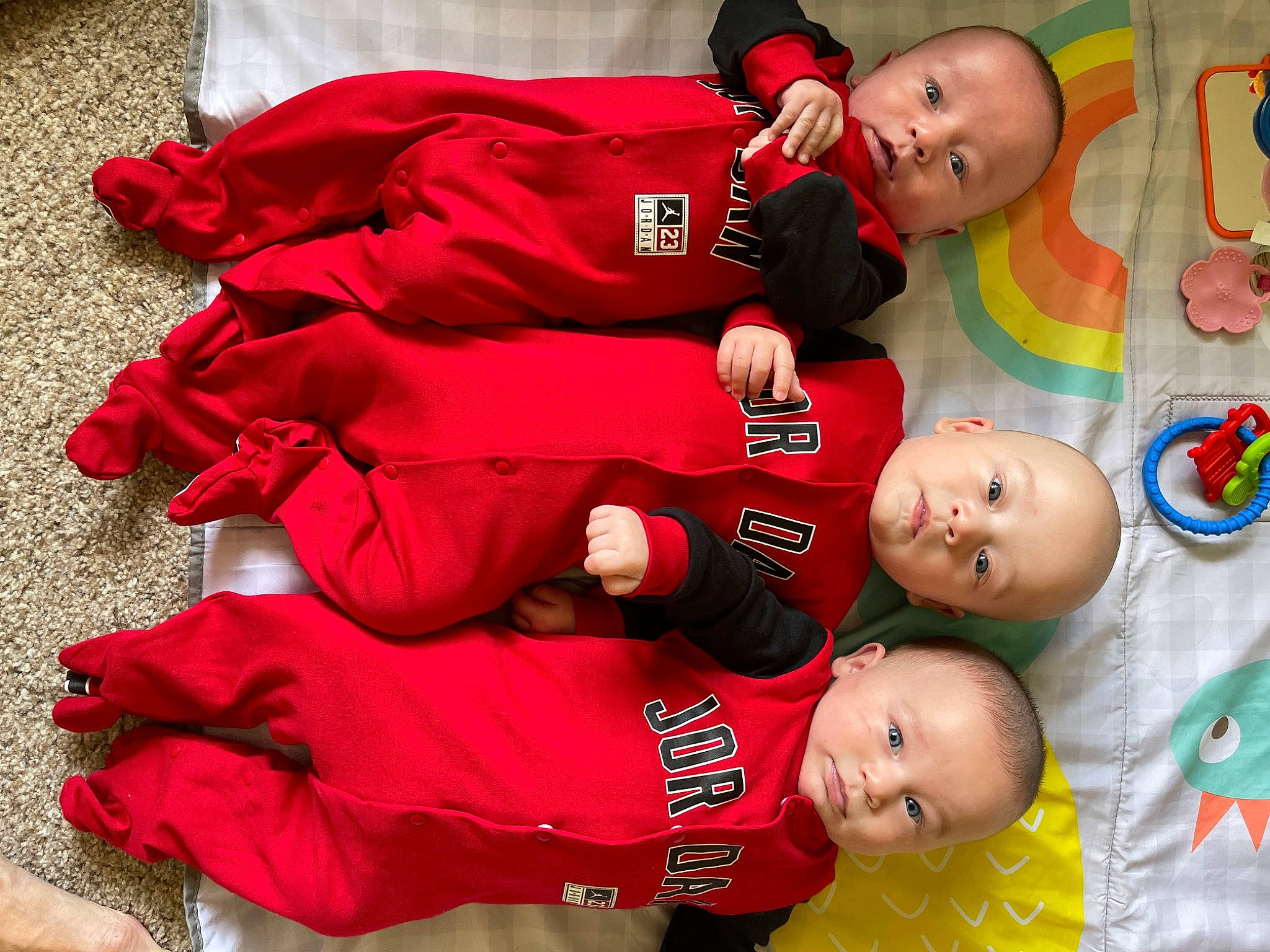 Colt Cash Blake is registered to the contest to win money with this photo: baby, baby_toddler_clothing, carmine, child, comfort, event, face, fun, green, happy, holiday, person, photograph, red, sleeve, smile, t_shirt, team, textile, toddler