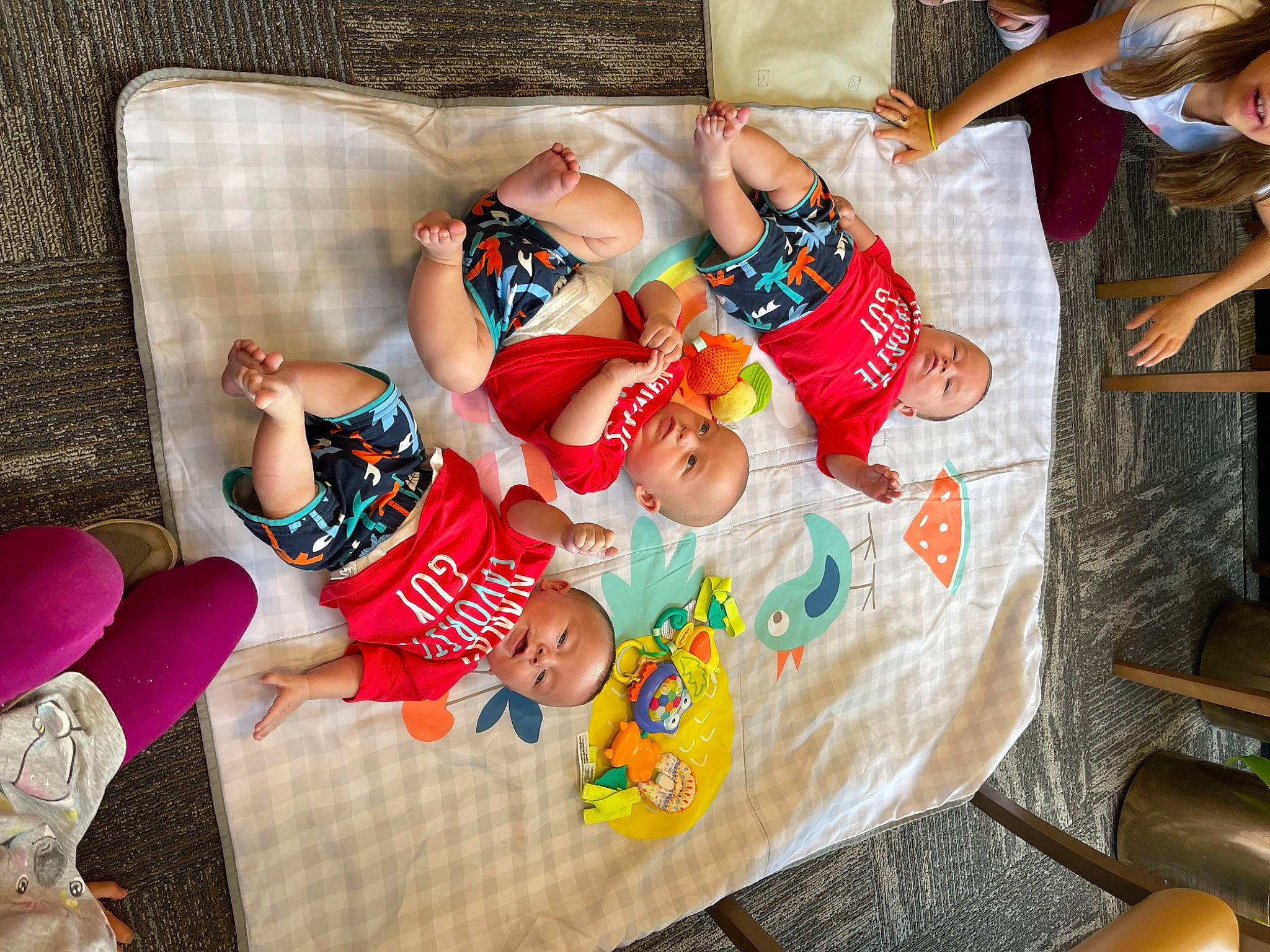 Cash is registered to the contest to win money with this photo: baby, baby_toddler_clothing, child, comfort, couch, event, foot, fun, happy, human_leg, lap, leisure, linens, nail, pattern, person, sock, t_shirt, textile, thigh