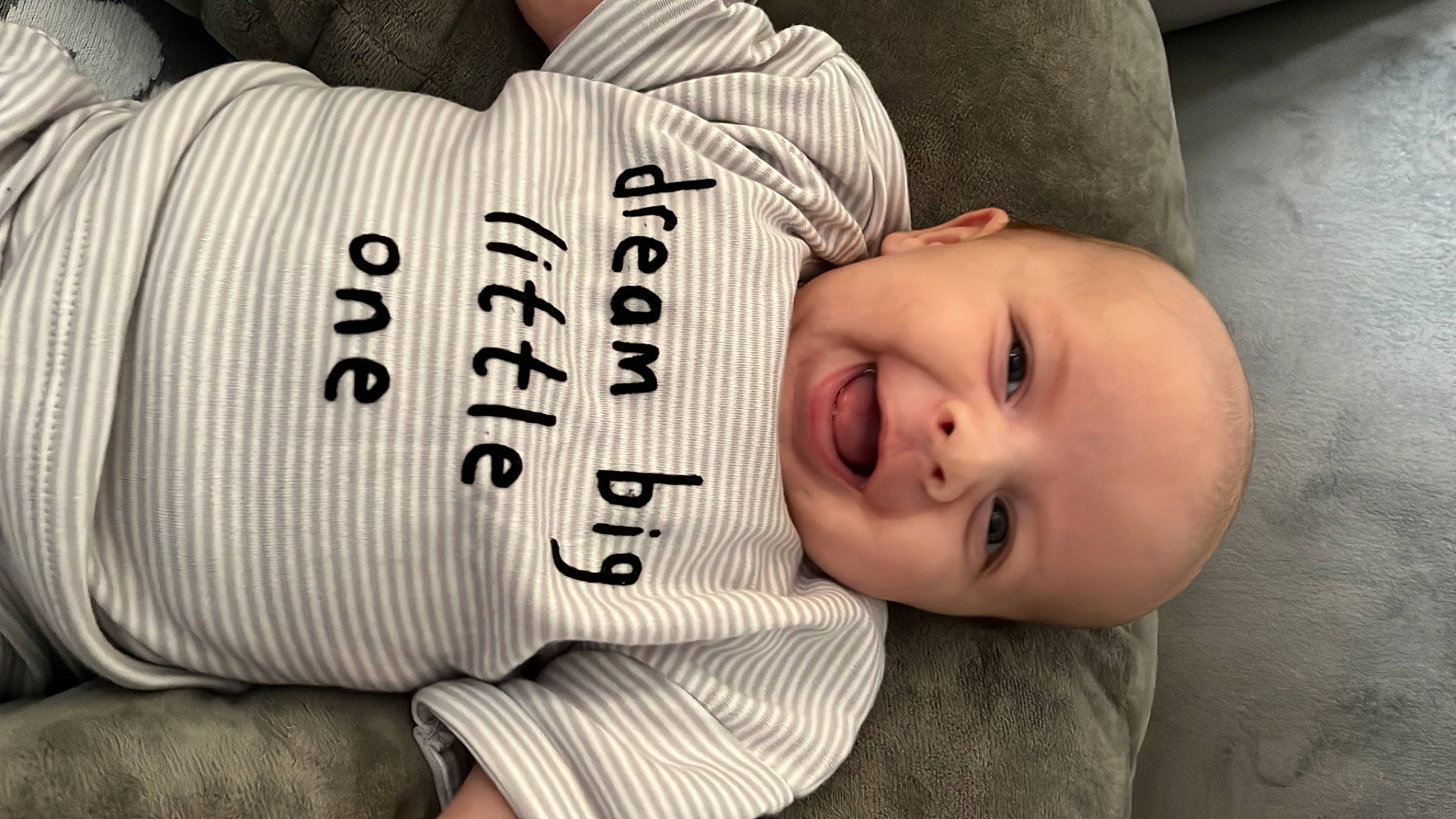 Jax joined the competition — help win amazing prizes! baby, baby_toddler_clothing, cheek, child, comfort, cool, face, facial_expression, font, happy, linens, mammal, person, plant, sitting, sleeve, smile, textile, toddler, vertebrate