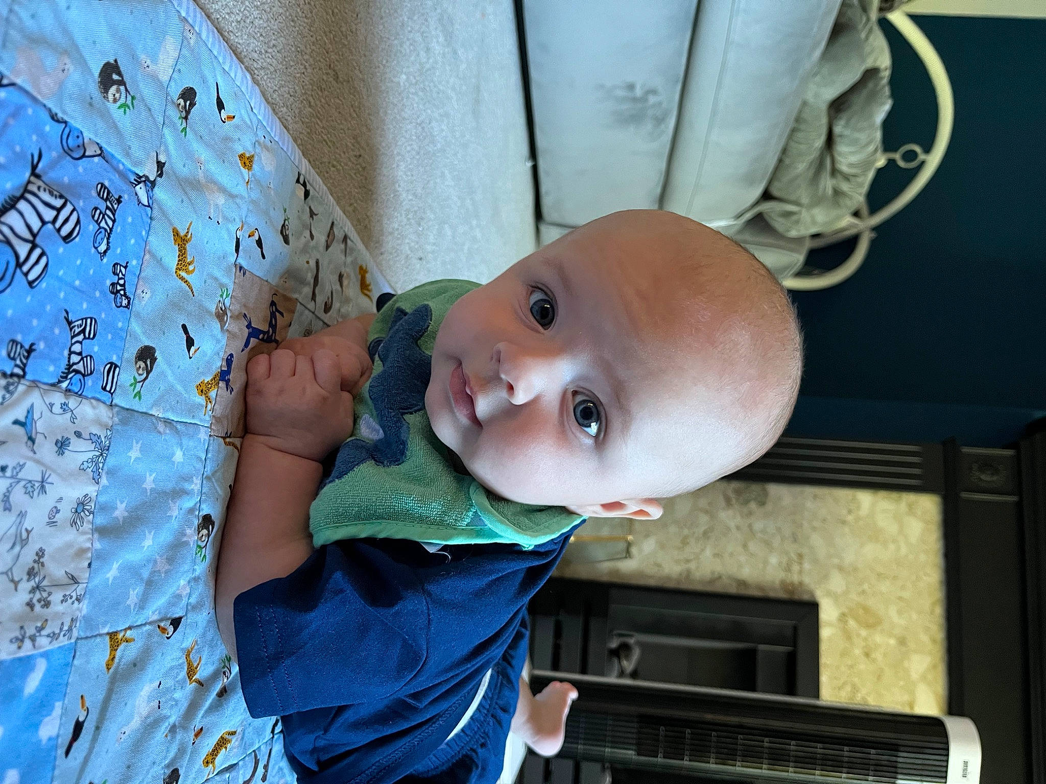Jax is registered to the contest to win money with this photo: arm, baby, baby_products, baby_safety, baby_toddler_clothing, cheek, child, comfort, eye, fun, happy, infant_bed, linens, pattern, person, room, sitting, smile, toddler, vacation
