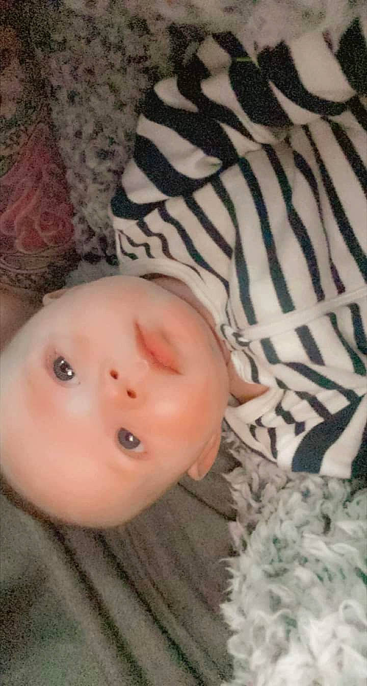Brantlee is registered to the contest to win money with this photo: baby, baby_toddler_clothing, cheek, child, comfort, eye, eyelash, facial_expression, fur, happy, human_body, iris, linens, lip, nose, pattern, person, skin, sleeve, toddler