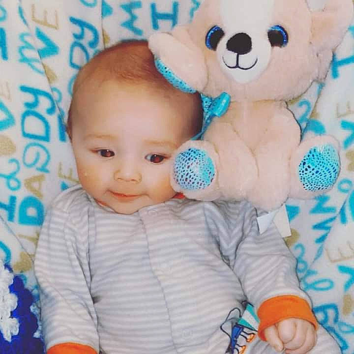 Brantlee joined the competition — help win amazing prizes! baby, baby_playing_with_toys, baby_toddler_clothing, blue, cheek, facial_expression, font, happy, nose, organ, people, person, pink, product, skin, sleeve, smile, textile, toddler, toy