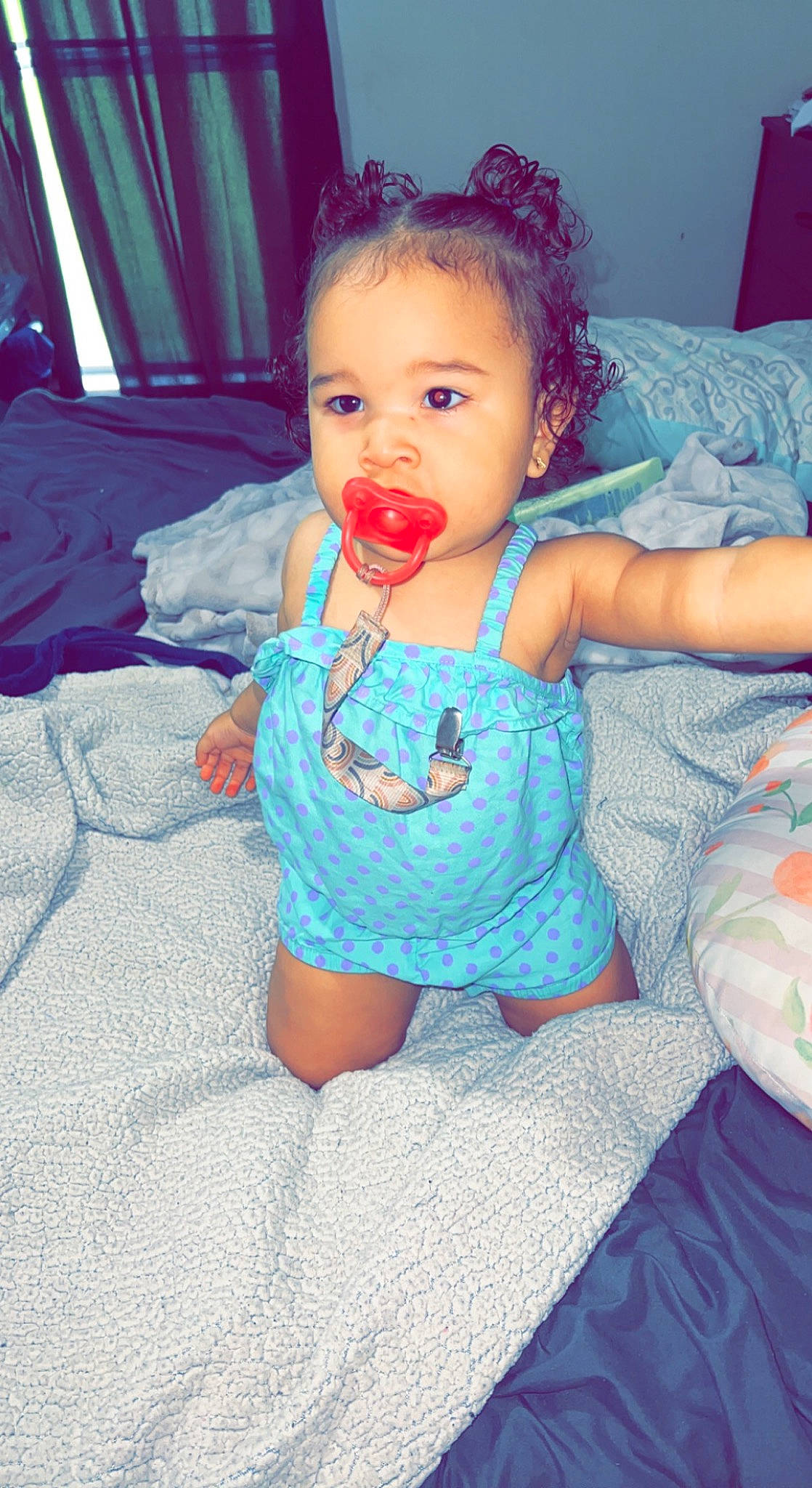 London joined the competition — help win amazing prizes! aqua, azure, baby, baby_toddler_clothing, cheek, child, comfort, dress, face, happy, human_body, iris, mouth, nose, pattern, person, pink, purple, skin, textile