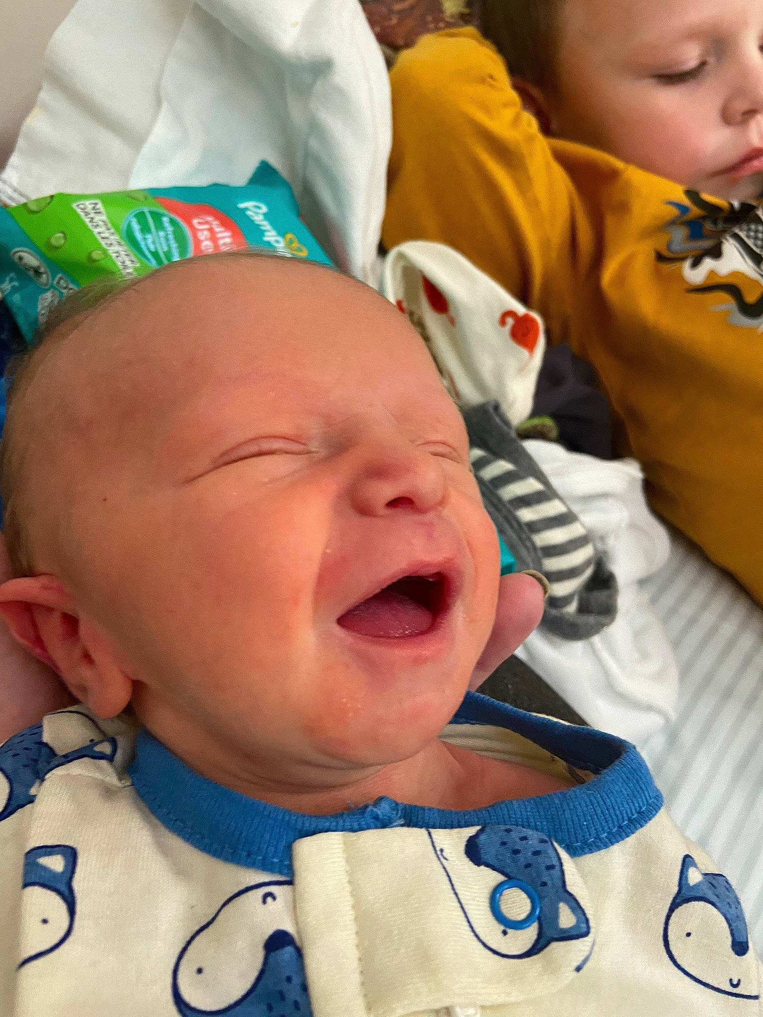 Ikaika is registered to the contest to win money with this photo: baby, baby_toddler_clothing, cheek, child, chin, clothing, eye, face, facial_expression, green, happy, hat, mouth, nose, people, person, skin, smile, toddler, white