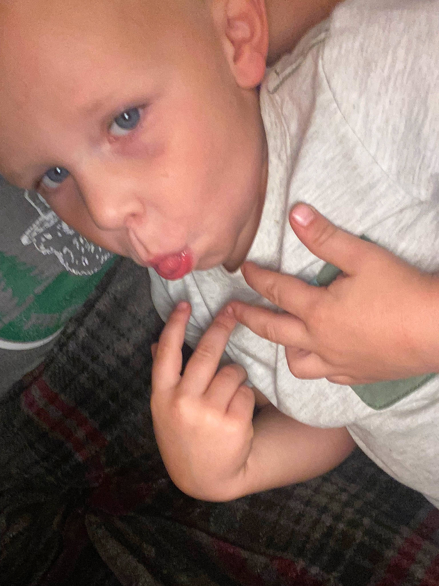 Wyatt is registered to the contest to win money with this photo: baby, baby_toddler_clothing, cheek, child, ear, elbow, eyelash, finger, gesture, hand, happy, iris, lip, mouth, nail, nose, person, skin, sleeve, thumb