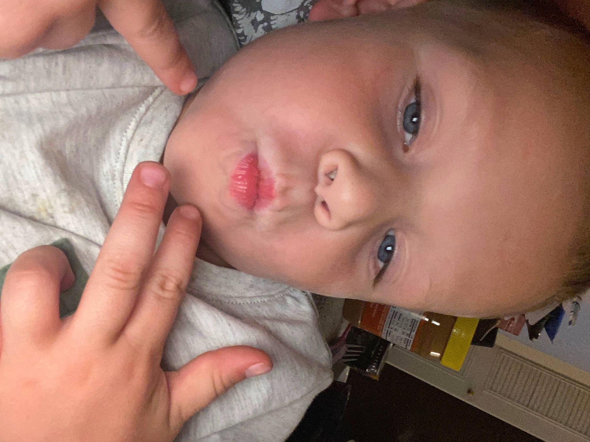 Wyatt is registered to the contest to win money with this photo: baby, cheek, child, ear, eye, eyelash, finger, forehead, gesture, hand, iris, lip, mouth, nail, neck, nose, organ, person, skin, thumb