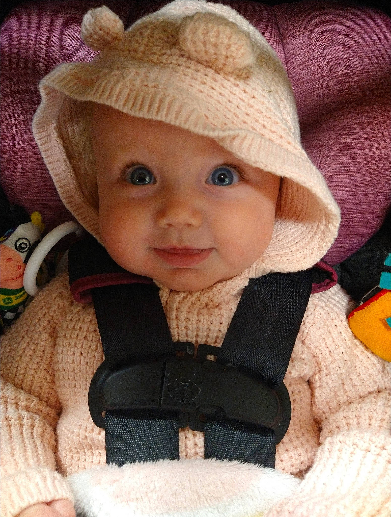 Emerson is registered to the contest to win money with this photo: baby, baby_carriage, baby_products, baby_toddler_clothing, cap, cheek, child, eye, face, hat, headgear, headwear, iris, nose, outerwear, person, skin, sleeve, smile, sun_hat