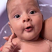 João joined the competition — help win amazing prizes! baby, infant, face, expression, water, bath, skin, hand, finger, cute, child, portrait, closeup, wet, person, curious, surprised, newborn, head, eyebrows