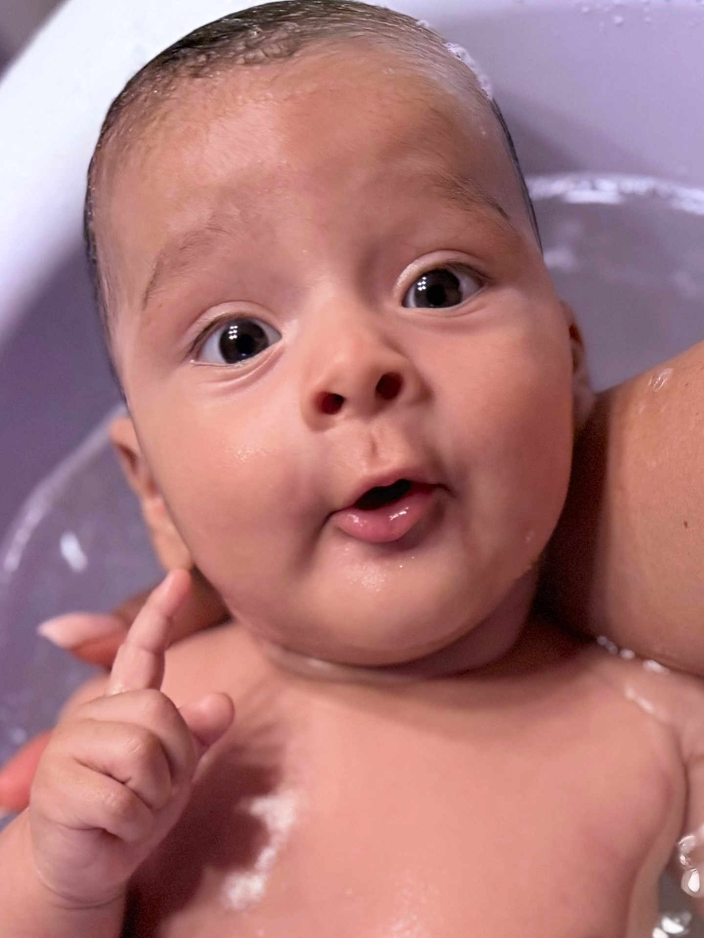 João joined the competition — help win amazing prizes! baby, infant, face, expression, water, bath, skin, hand, finger, cute, child, portrait, closeup, wet, person, curious, surprised, newborn, head, eyebrows