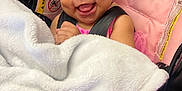 Jayella joined the competition — help win amazing prizes! baby, child, car_seat, blanket, pink_bow, smile, happy, infant, clothing, seatbelt, fabric, cute, headband, person, toddler, indoors, soft_texture, wrapped, closeup, face